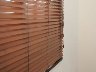 Faux Wood Blinds in a Sunlit Room